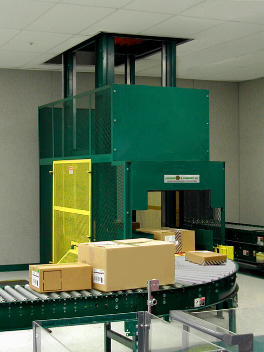 Installation of a Continuous Vertical Conveyor handling cased goods.