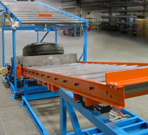 Gravity Conveyor with a Vertical Switch Gate; designed to present empty pallets to an automated gantry loading process.