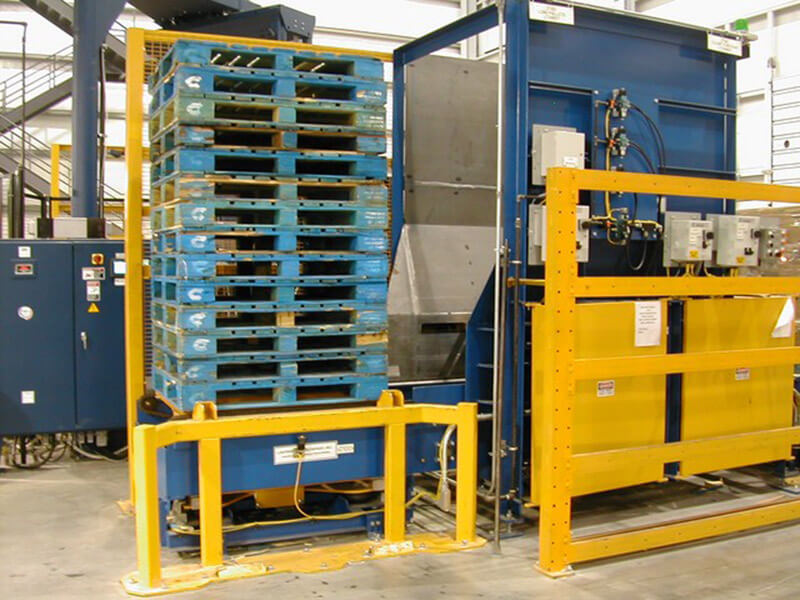Pallet Dispenser that feeds pallets to operator input stations prior to induction to an AS/RS.