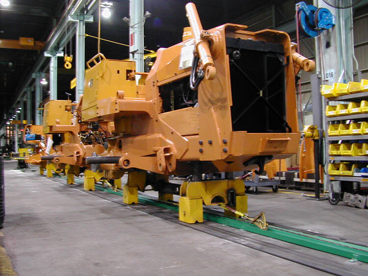 Tow-Line Conveyor Assembly line for Excavators. Handled loads from a minimum of 3,000 up to 27,000 pounds