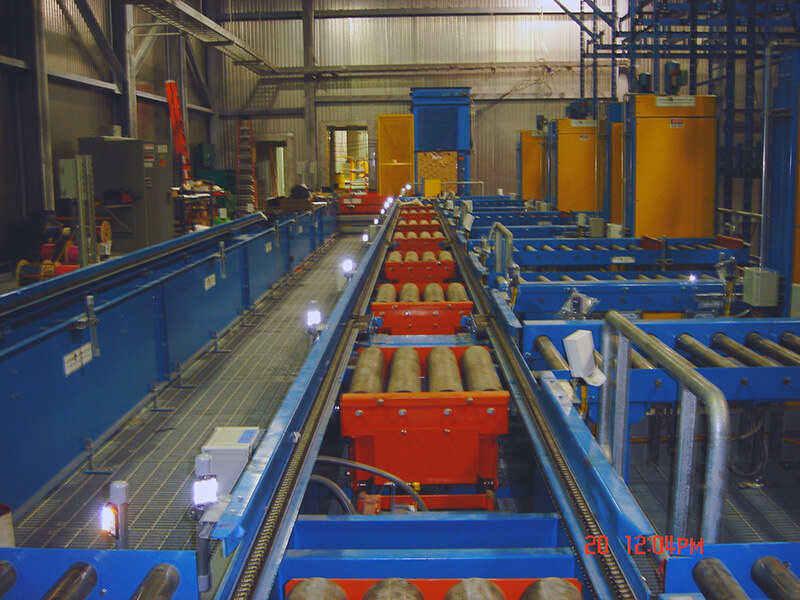 Conveyor System for Poultry Processing. Designed for -20F operating environment, equipment included CDLR Conveyors, Chain Conveyors & Roller Transfers.