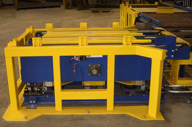 Fork Lift barriers to protect conveyors and to provide loading guides for pallet loading station.