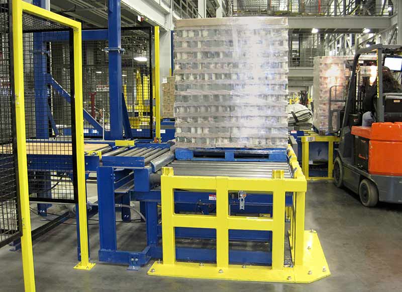 Fork Lift barriers to protect conveyors at pallet pick up stations.
